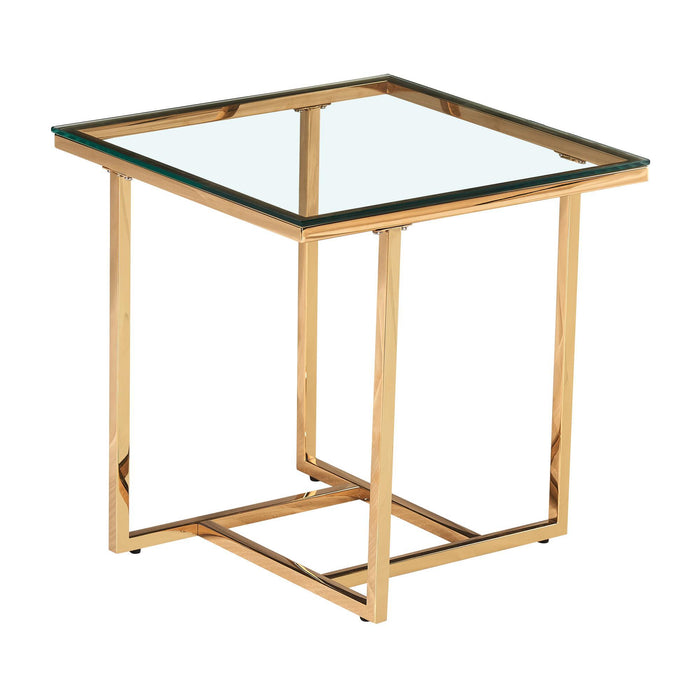Mesa auxiliar dorada de metal con vidrio